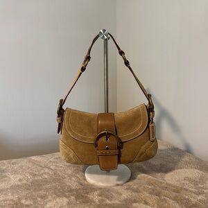 Stunning Vintage Coach Soho authentic suede bag with signature fabric lining.
